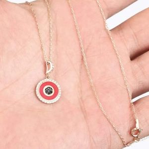 Evil eye protection red enamel gold necklace